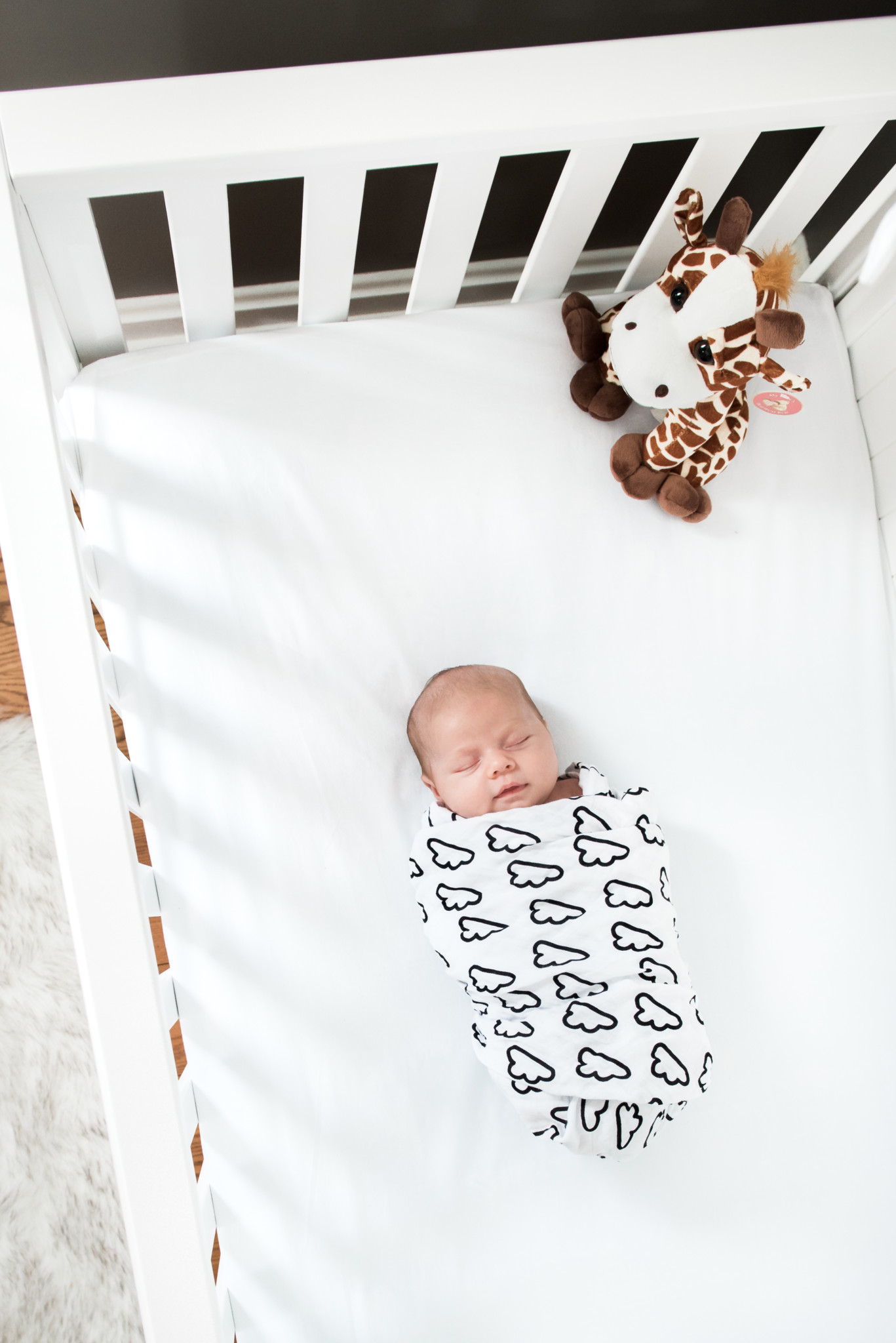newborn boy room in grey and white with arrows and stripes in a in home lifestyle newborn photography session in Pittsburgh and Cranberry Twp PA 16066